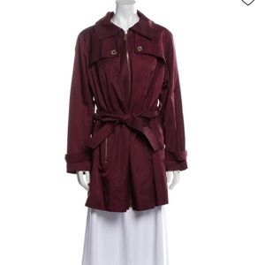A cranberry red michael kors trench coat, size M. Like new, worn twice